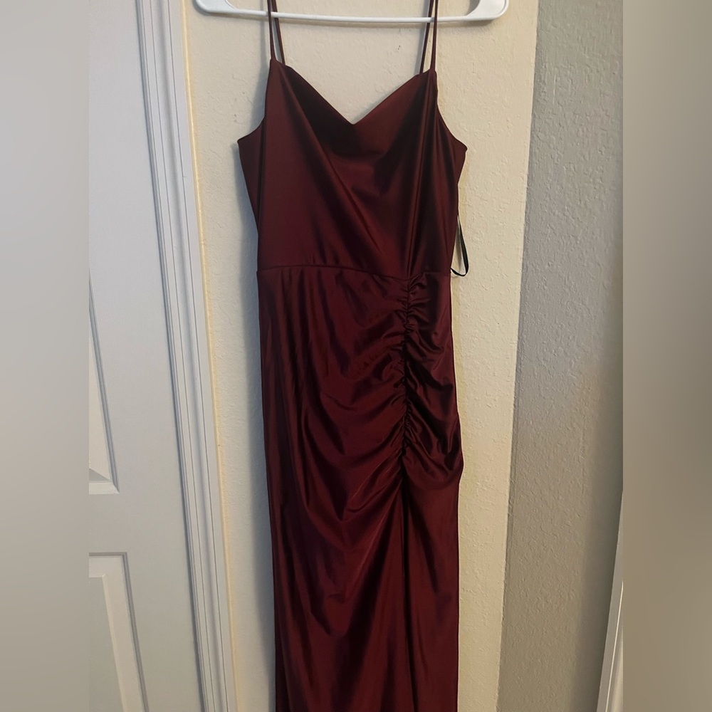 Sexy Red dress, with one leg opening. It adjust perfect to your body.